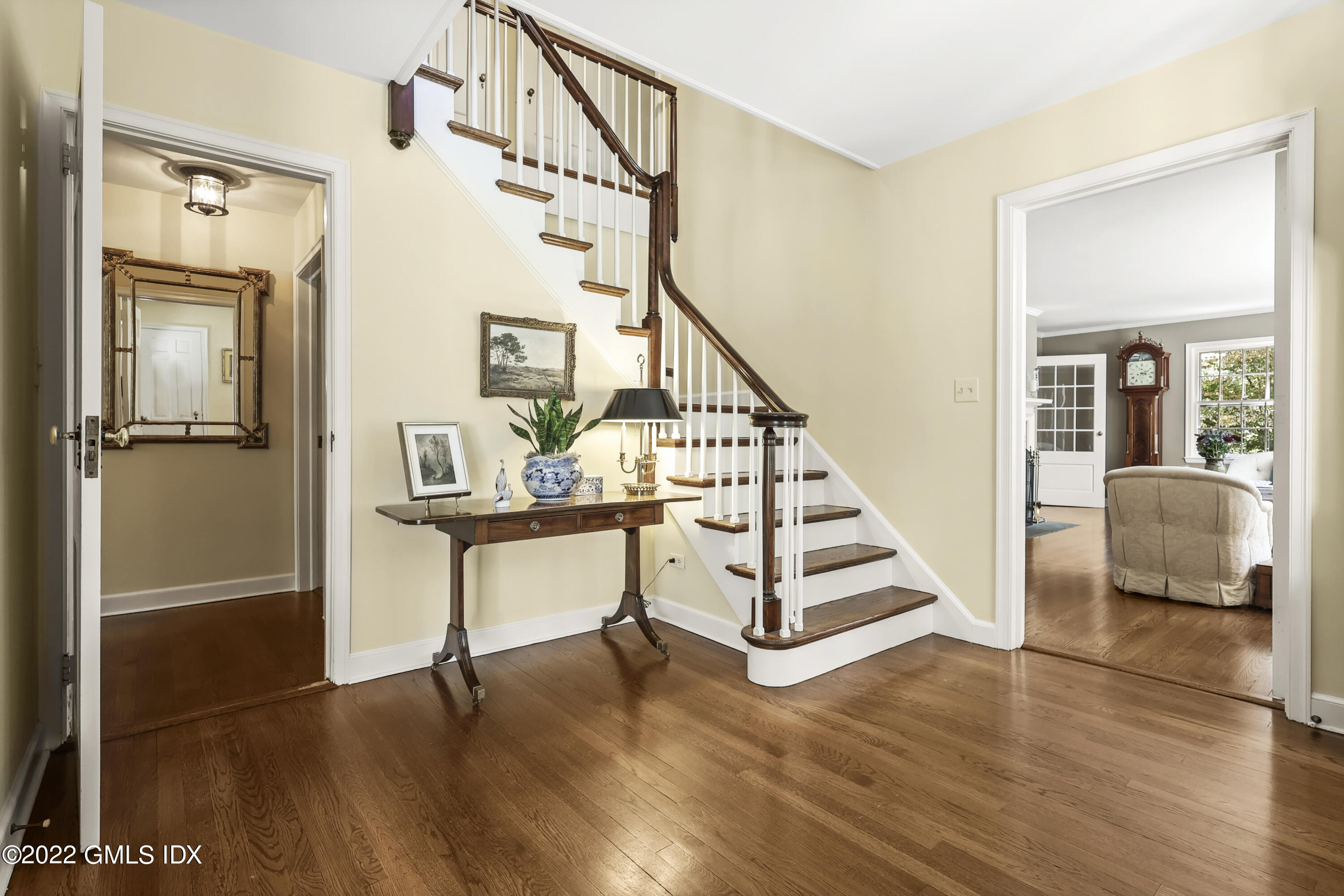 141 Hendrie Avenue Riverside, CT 06878 - Photo 5 of 34 a view of a hallway with furniture and wooden floor