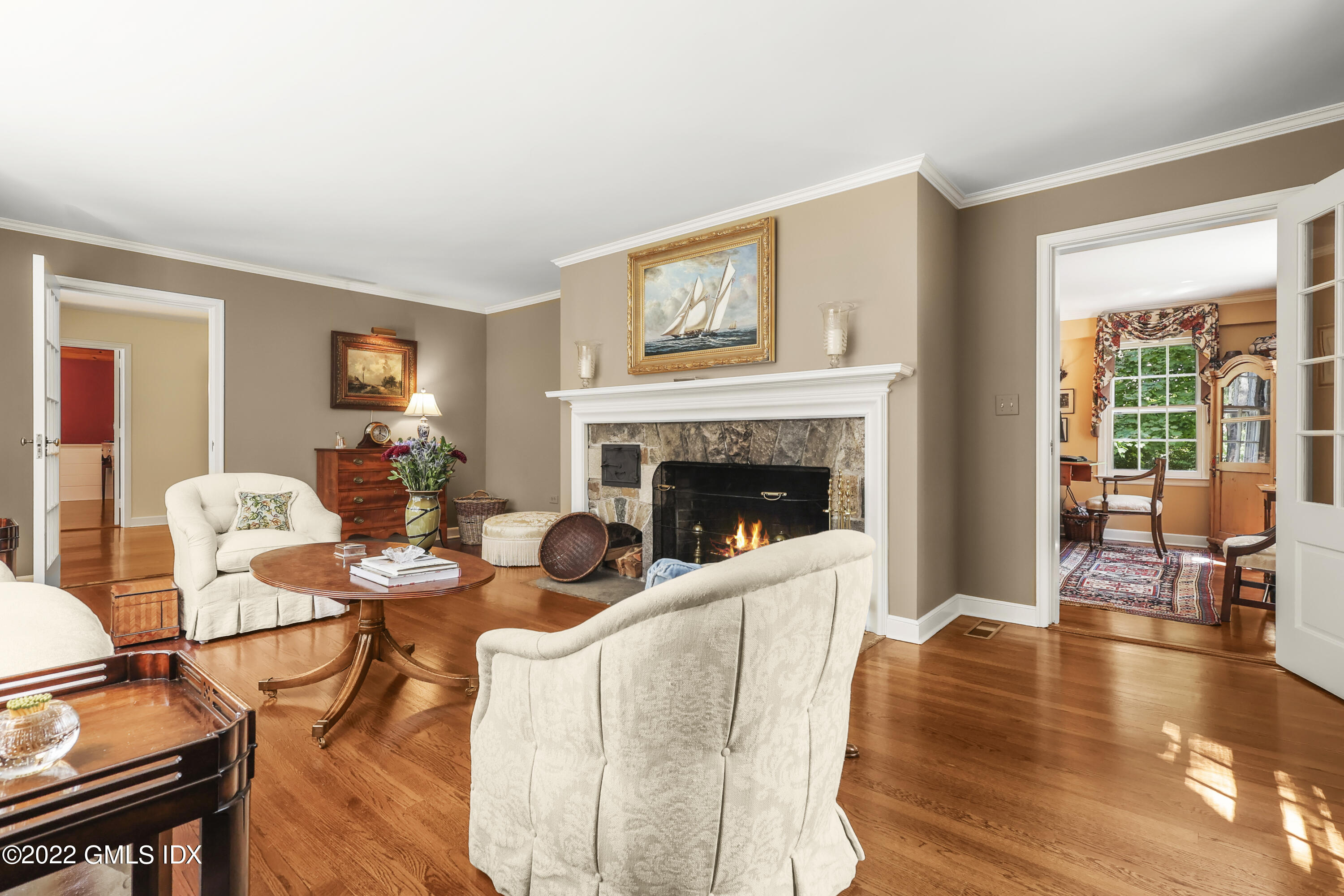 141 Hendrie Avenue Riverside, CT 06878 - Photo 7 of 34 a living room with furniture and a fireplace