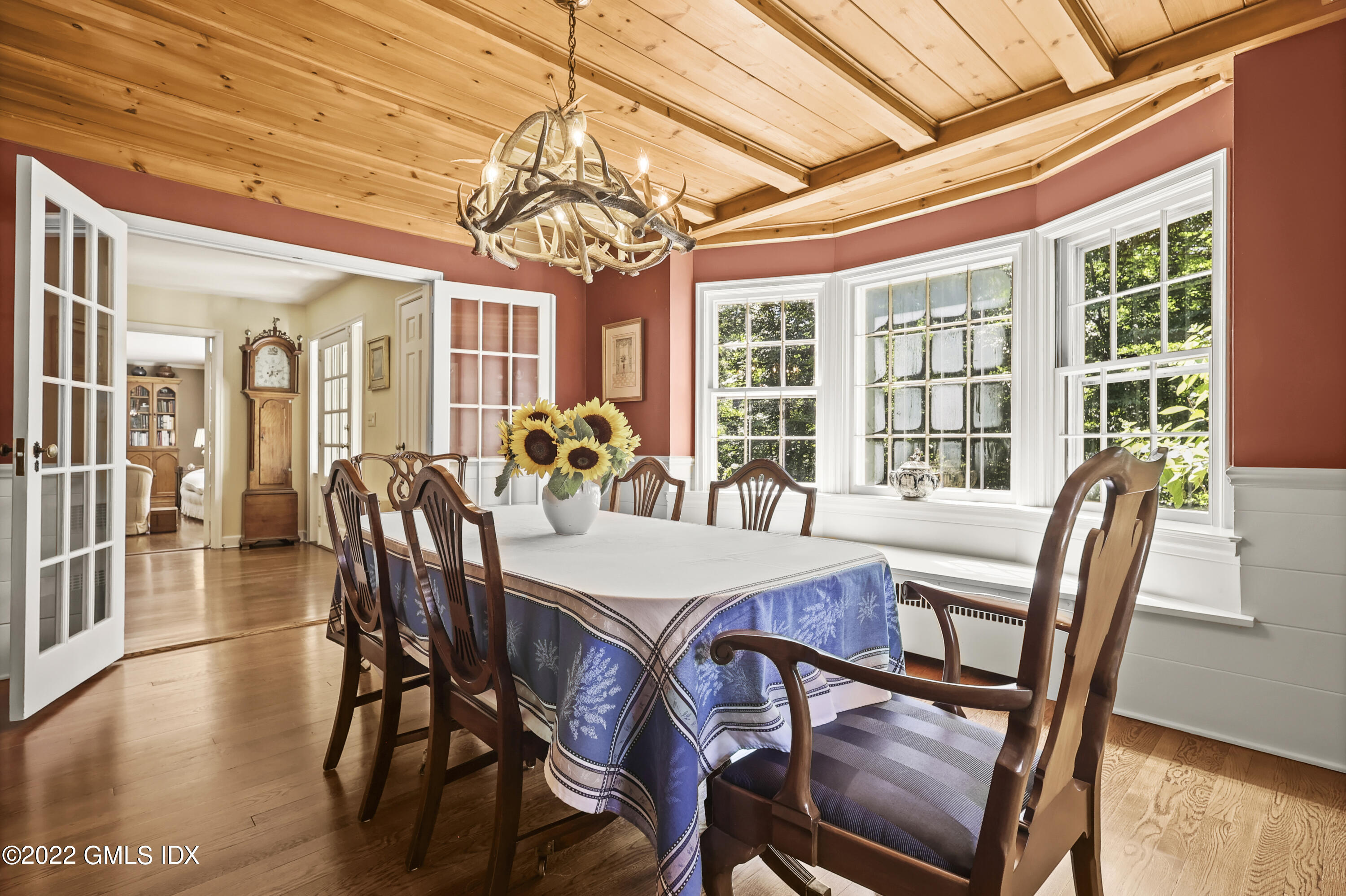 141 Hendrie Avenue Riverside, CT 06878 - Photo 8 of 34 a view of a dining room with furniture wooden floor and chandelier