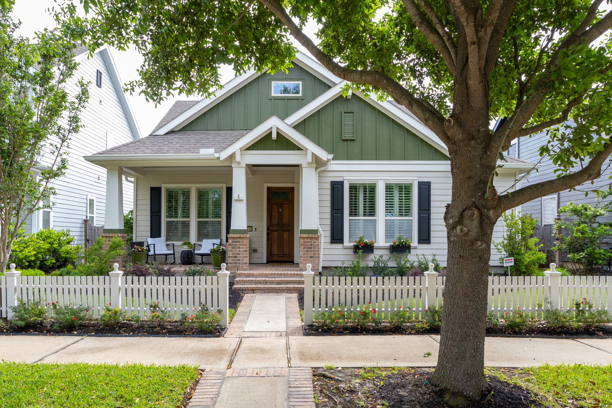 16650 Seminole Ridge Drive Cypress, TX 77433 - Photo 1 of 27 a front view of a house with a garden and plants