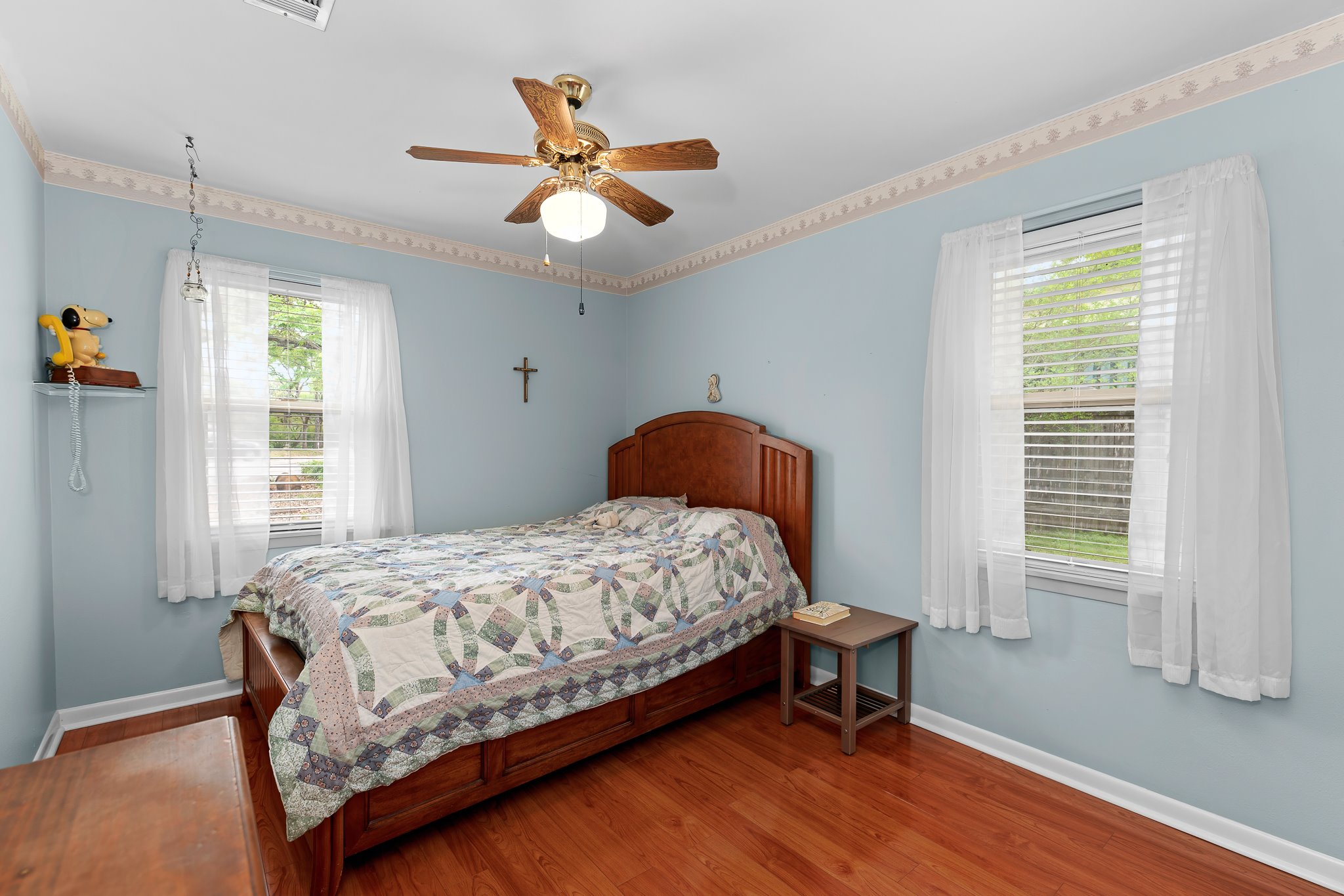 5600 Libyan Circle Austin, TX 78745 - Photo 29 of 37 Bedroom with wood finished floors and a ceiling fan
