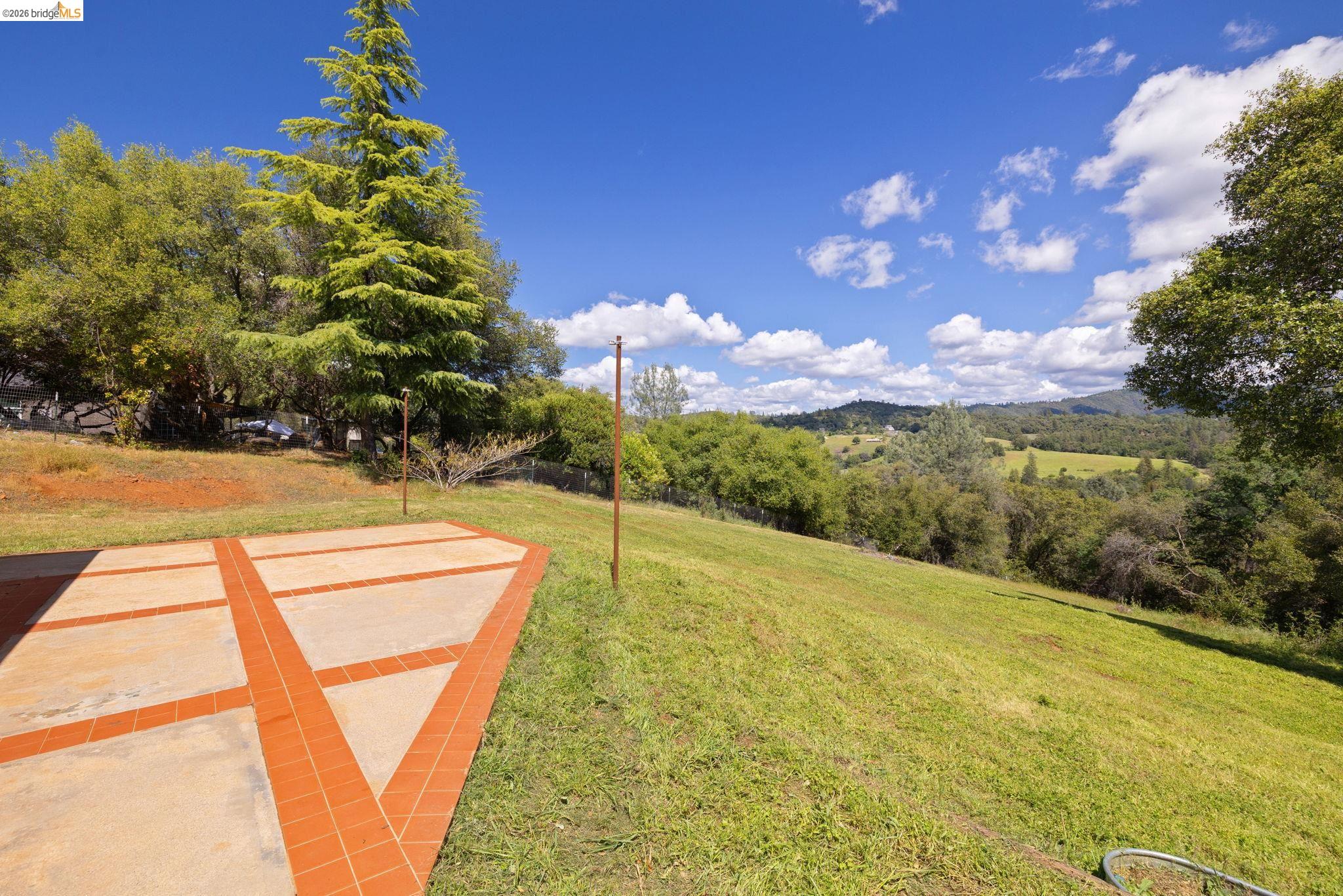 23245 Isabella Court Columbia, CA 95310 - Photo 2 of 34 a view of an outdoor space and a yard