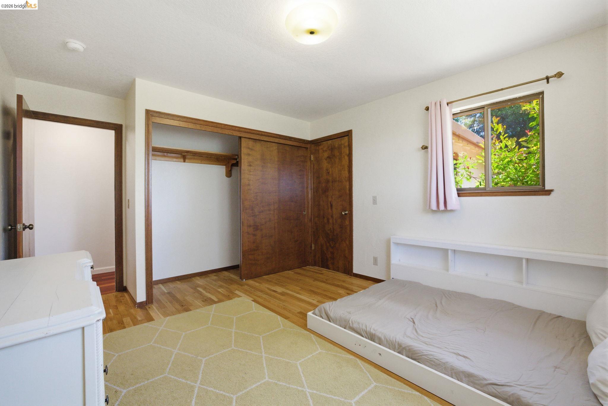 23245 Isabella Court Columbia, CA 95310 - Photo 25 of 34 a bedroom with a bed and a window