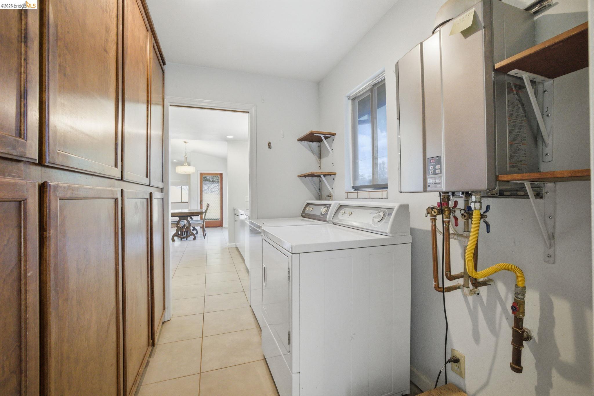 23245 Isabella Court Columbia, CA 95310 - Photo 29 of 34 a utility room with dryer and washer