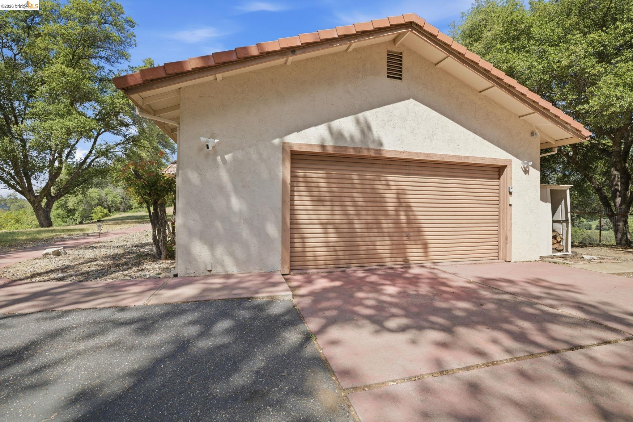 23245 Isabella Court Columbia, CA 95310 - Photo 34 of 34 a front view of a house with a yard