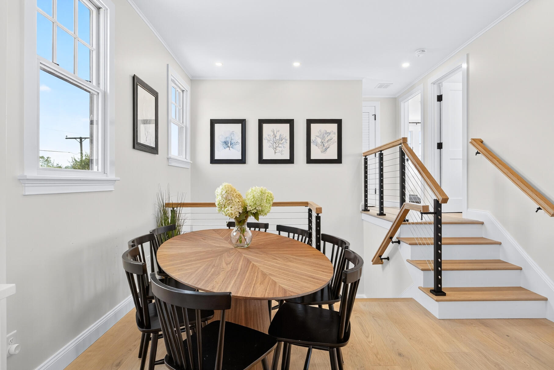 65 Harmes Way Eastham, MA 02642 - Photo 13 of 35 a view of a dining room with furniture and wooden floor