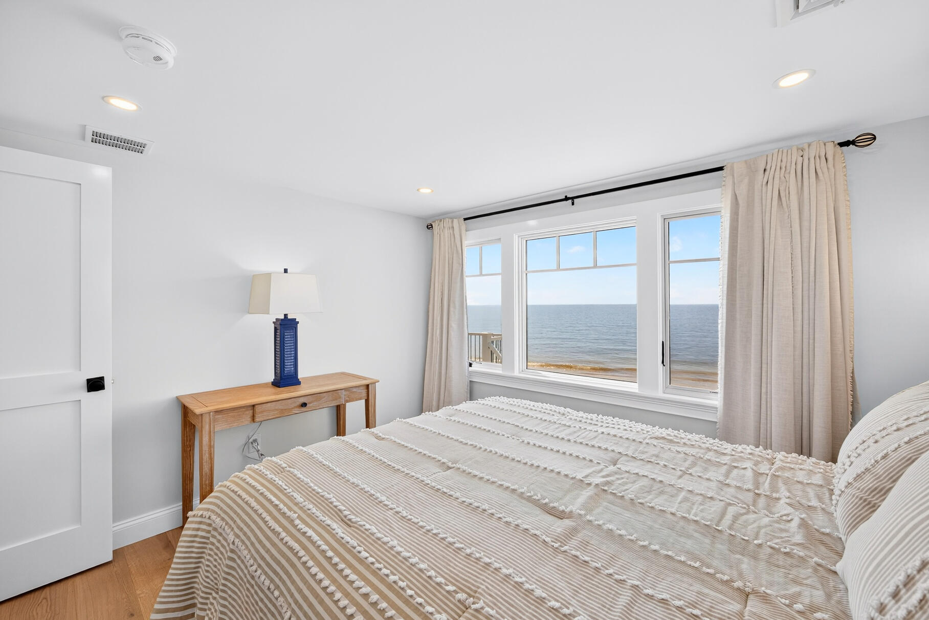 65 Harmes Way Eastham, MA 02642 - Photo 16 of 35 a bedroom with a bed and a window