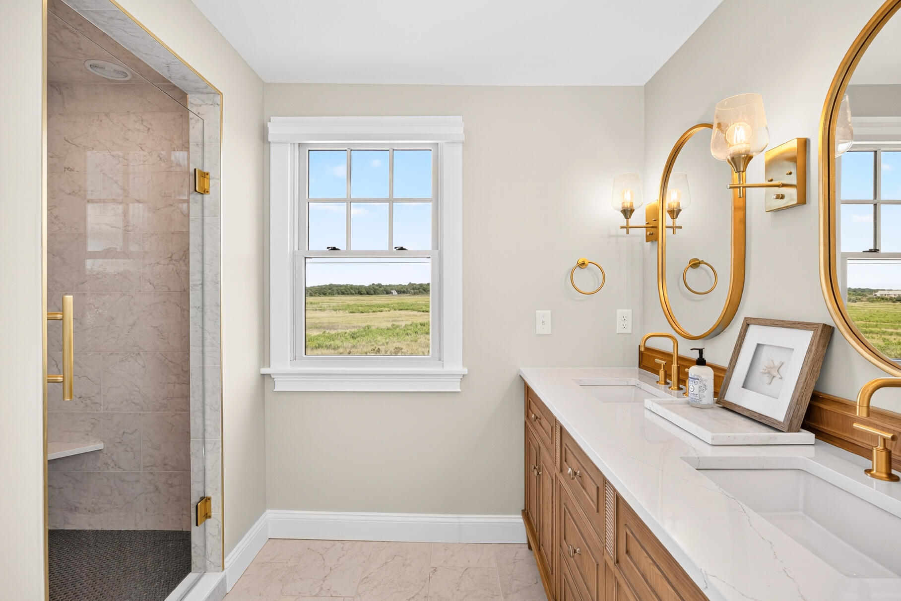 65 Harmes Way Eastham, MA 02642 - Photo 17 of 35 a bathroom with a sink and a mirror