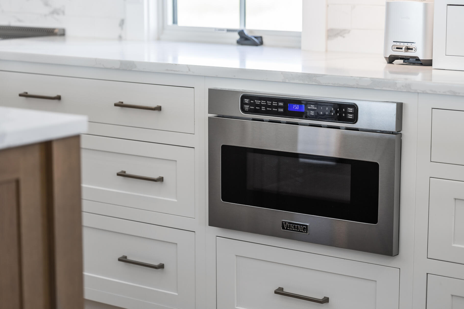 65 Harmes Way Eastham, MA 02642 - Photo 22 of 35 a close view of a stove top oven sitting inside of a kitchen