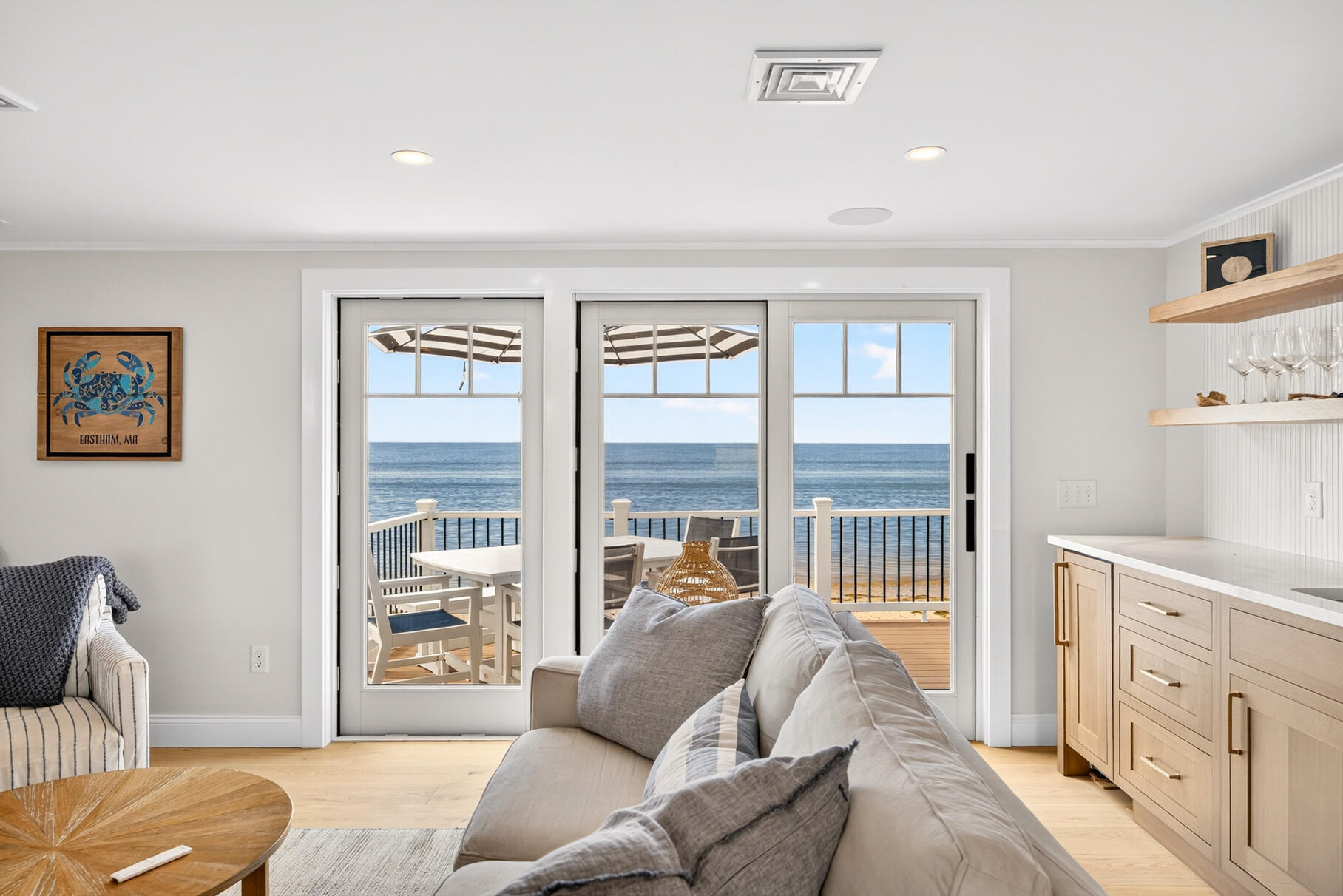 65 Harmes Way Eastham, MA 02642 - Photo 10 of 35 a living room with furniture and a large window