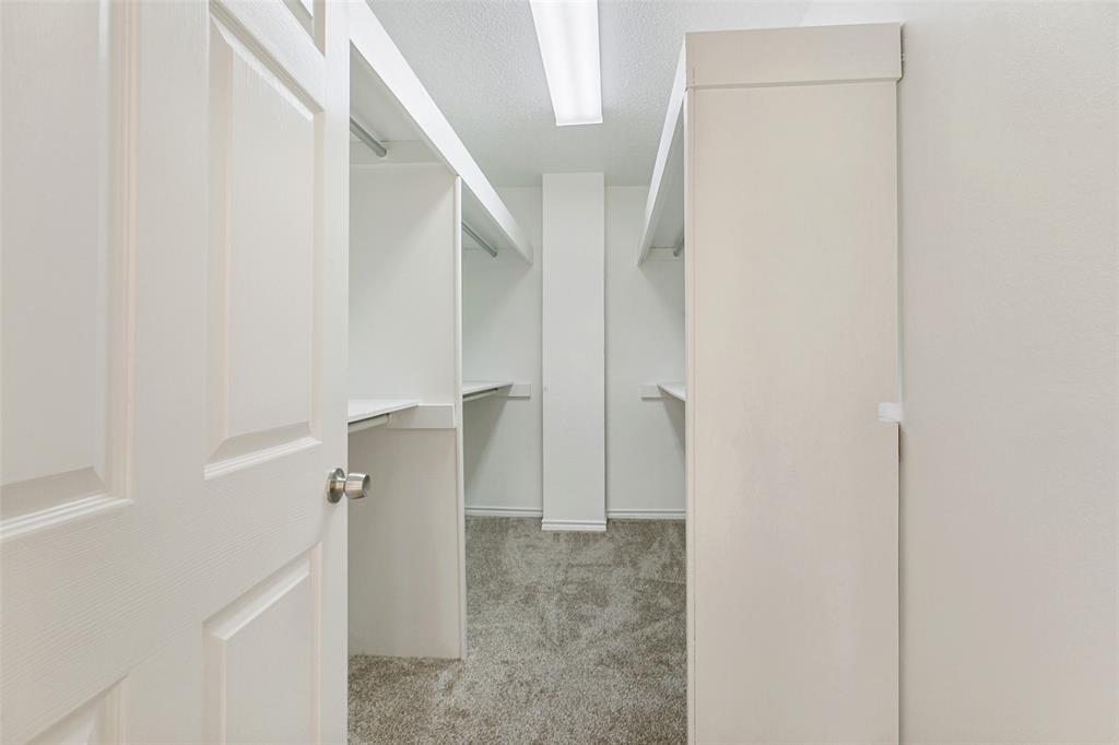 703 Rams Court Richardson, TX 75081 - Photo 20 of 23 Upstairs is a large walk-in closet/storage room.