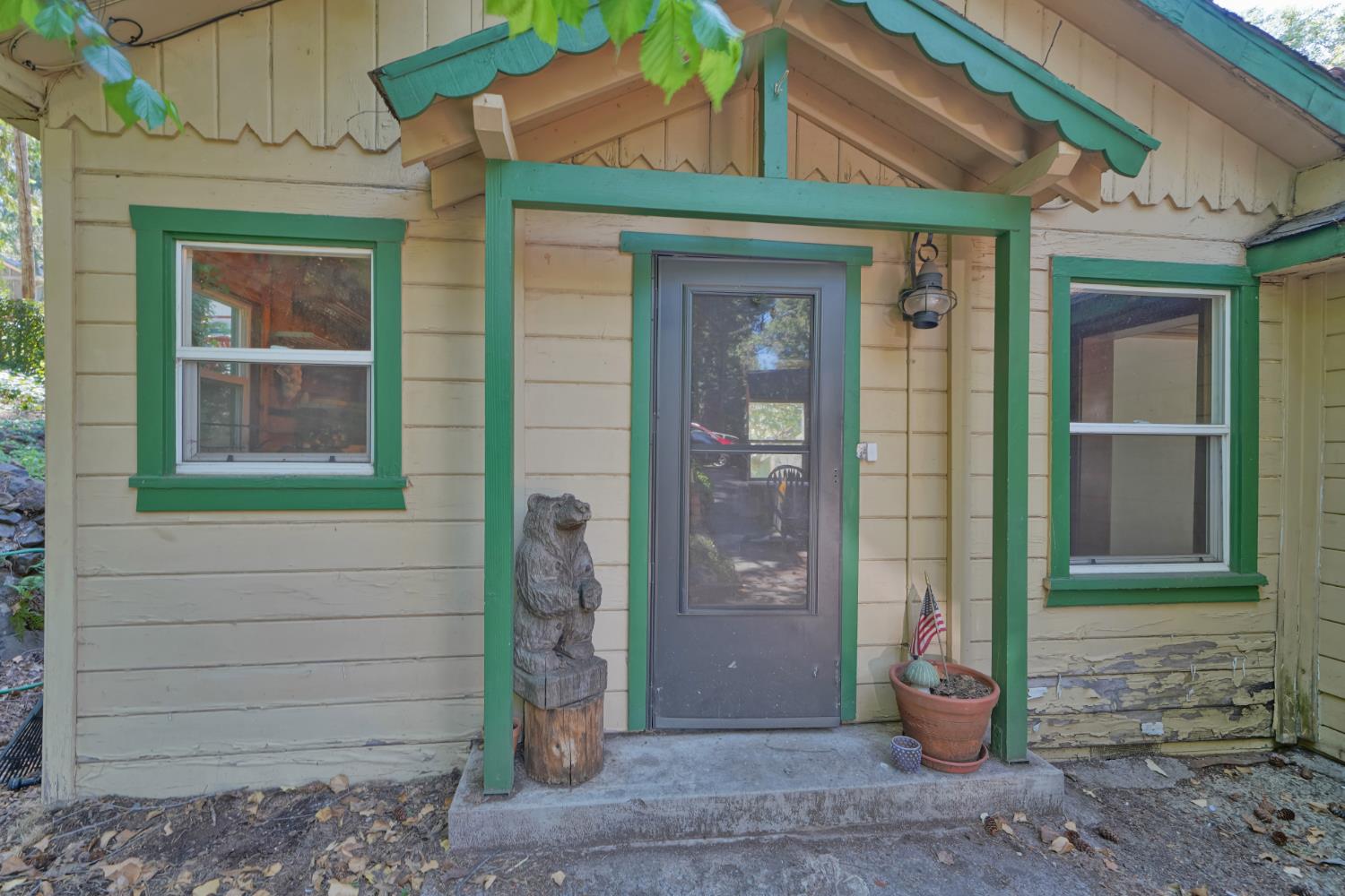 6929 Split Bend Road Pollock Pines, CA 95726 - Photo 3 of 38 a front view of a house with a