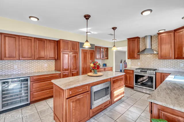a kitchen that has a stove and a sink