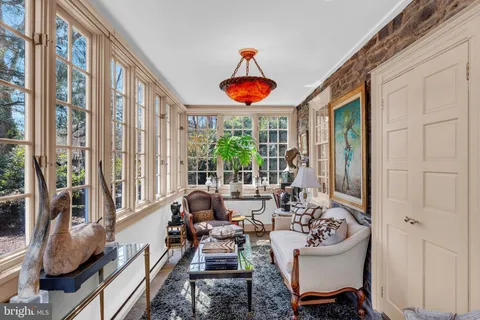 a view of a living room and a large window
