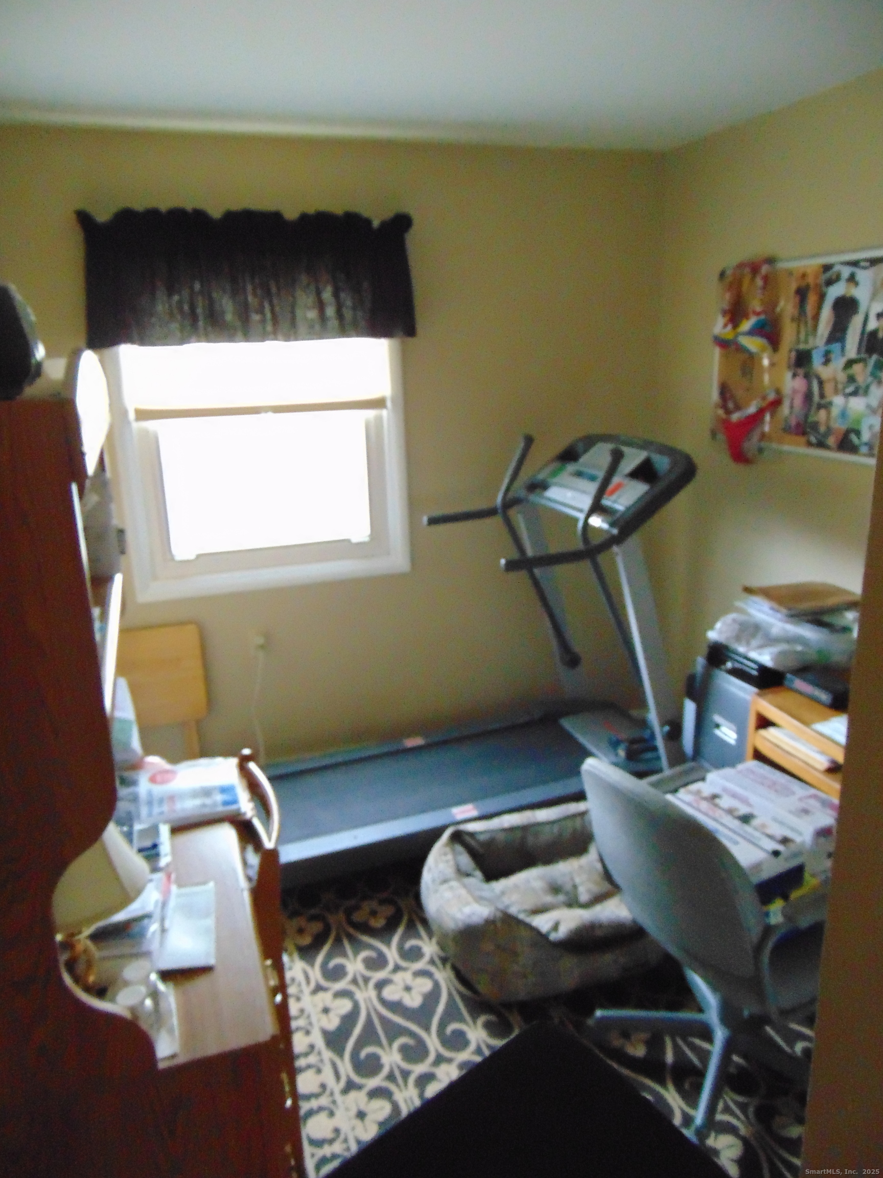 57 Alling Street Extension West Haven, CT 06516 - Photo 28 of 38 a living room with furniture and a wooden floor