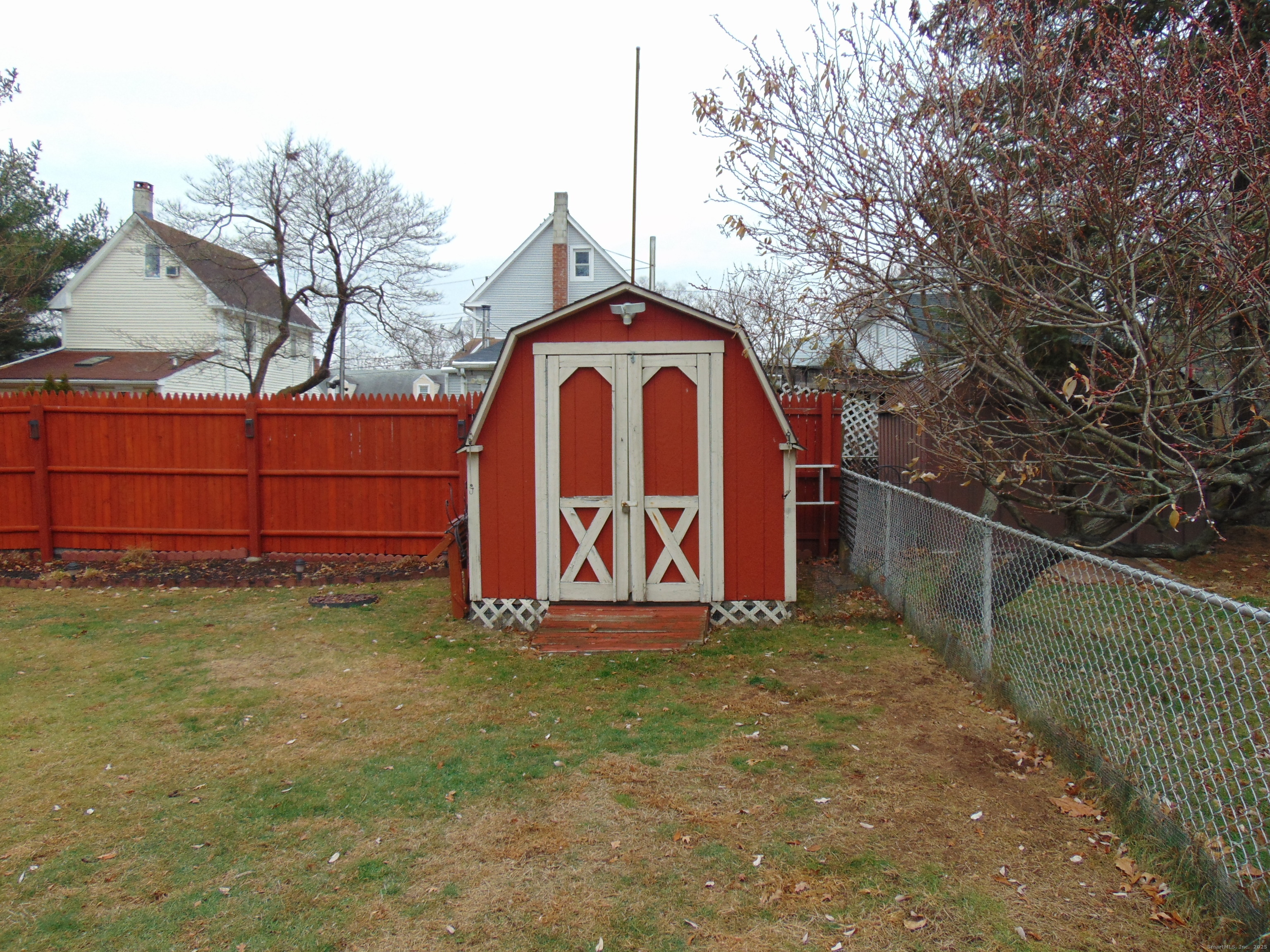57 Alling Street Extension West Haven, CT 06516 - Photo 31 of 38 a view of backyard with tree
