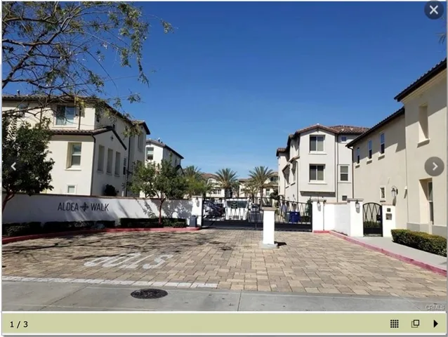 a view of a street with cars