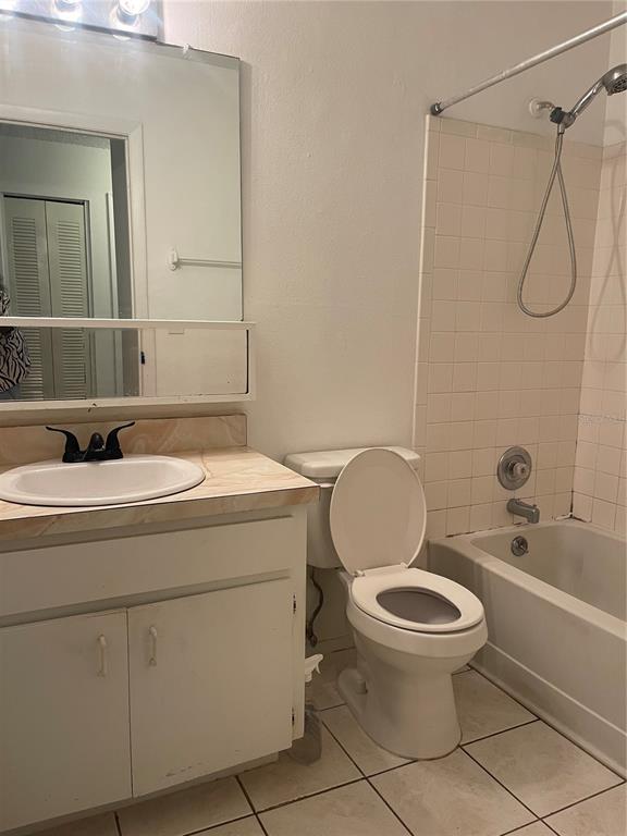 1015 Hickory Road Ocala, FL 34472 - Photo 9 of 14 a bathroom with a sink toilet and shower