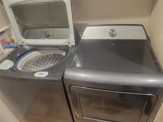 a bathroom with a bathtub and toilet