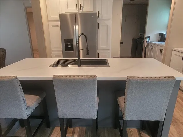 a close view of a sink and chair