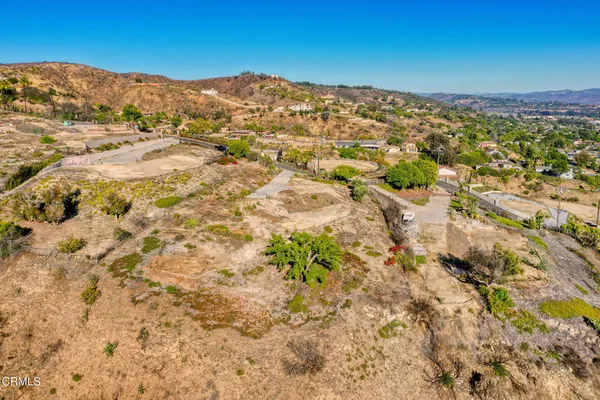 a view of a city with mountains in the background