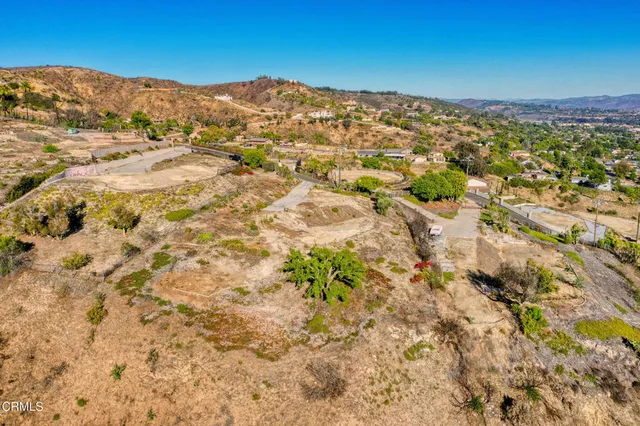 a view of a city with mountains in the background