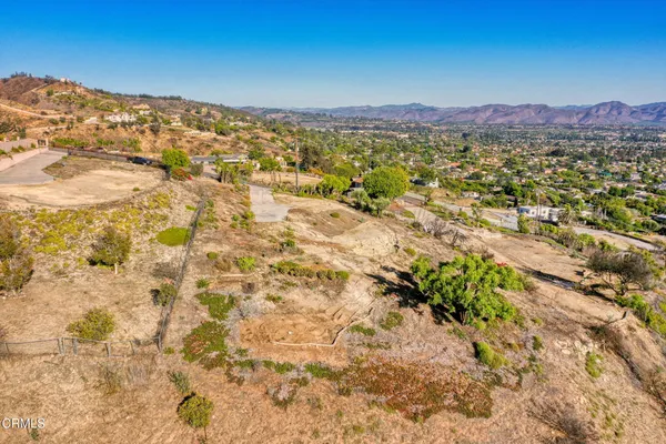 a view of a city with mountains in the background