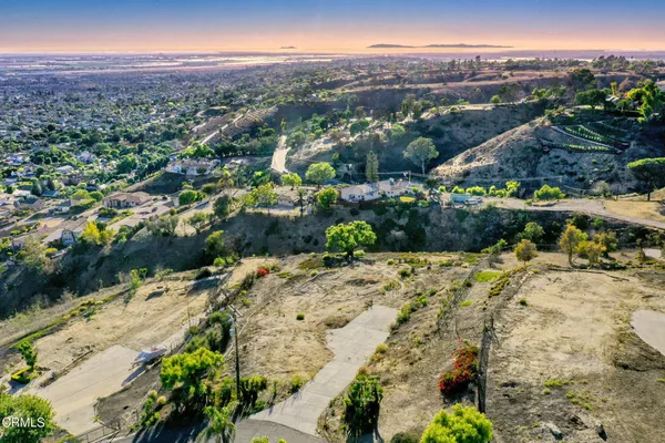 a view of a yard with a mountain