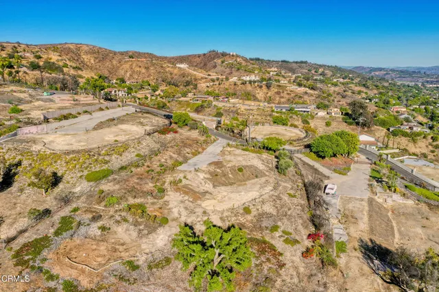 a view of a city with mountains in the background