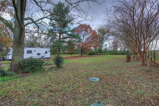 a view of backyard with green space