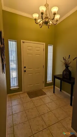 a view of a bedroom with a window