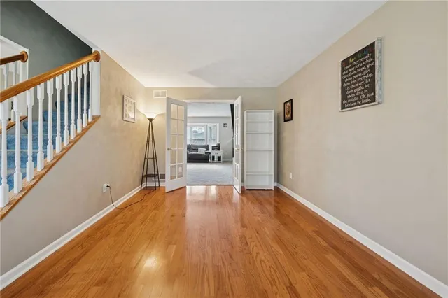 a bathroom with a sink and mirror