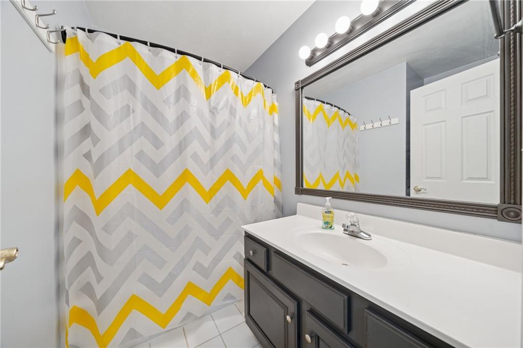 227 Sandworks Road Hunker, PA 15639 - Photo 25 of 41 a bathroom with a sink and a mirror