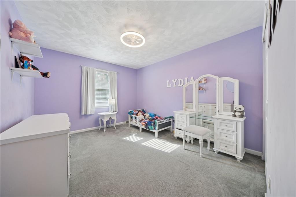 227 Sandworks Road Hunker, PA 15639 - Photo 27 of 41 a bedroom with furniture and a window