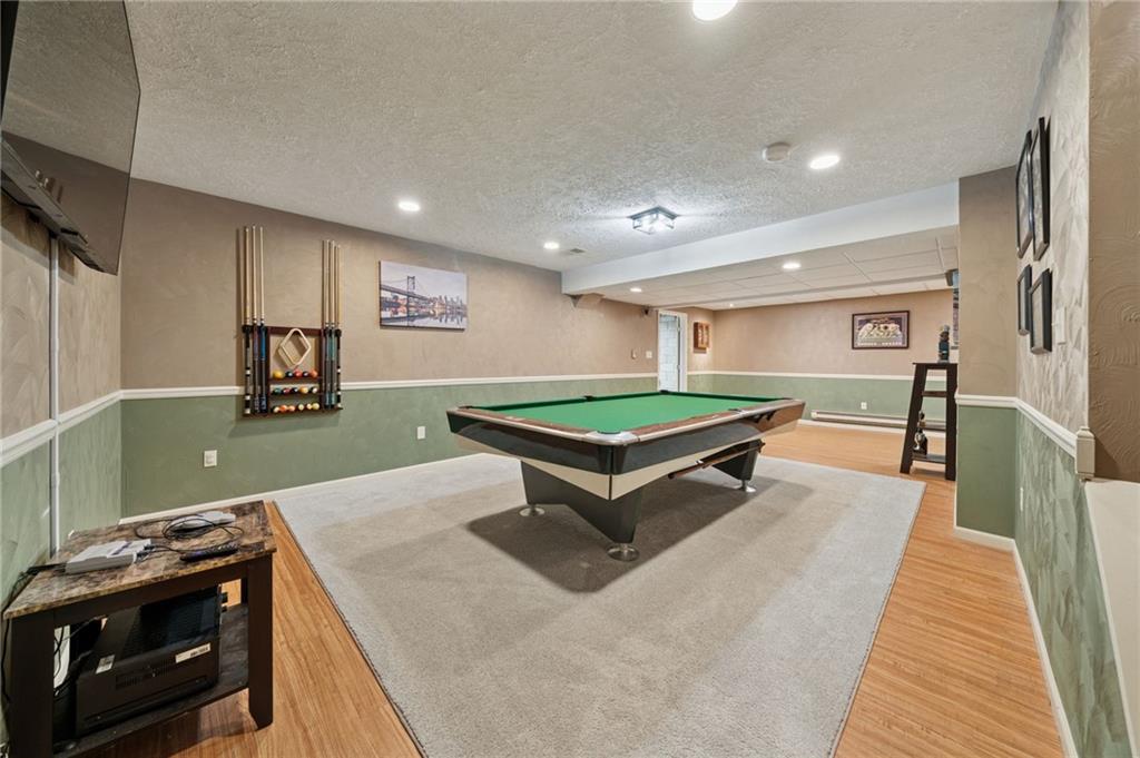 227 Sandworks Road Hunker, PA 15639 - Photo 31 of 41 a living room with stainless steel appliances furniture and a kitchen view