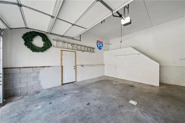 a view of yard with swimming pool and trees