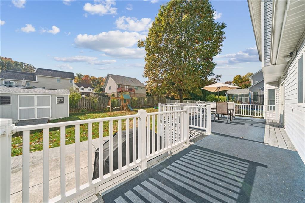 227 Sandworks Road Hunker, PA 15639 - Photo 37 of 41 a view of a brick building from a balcony