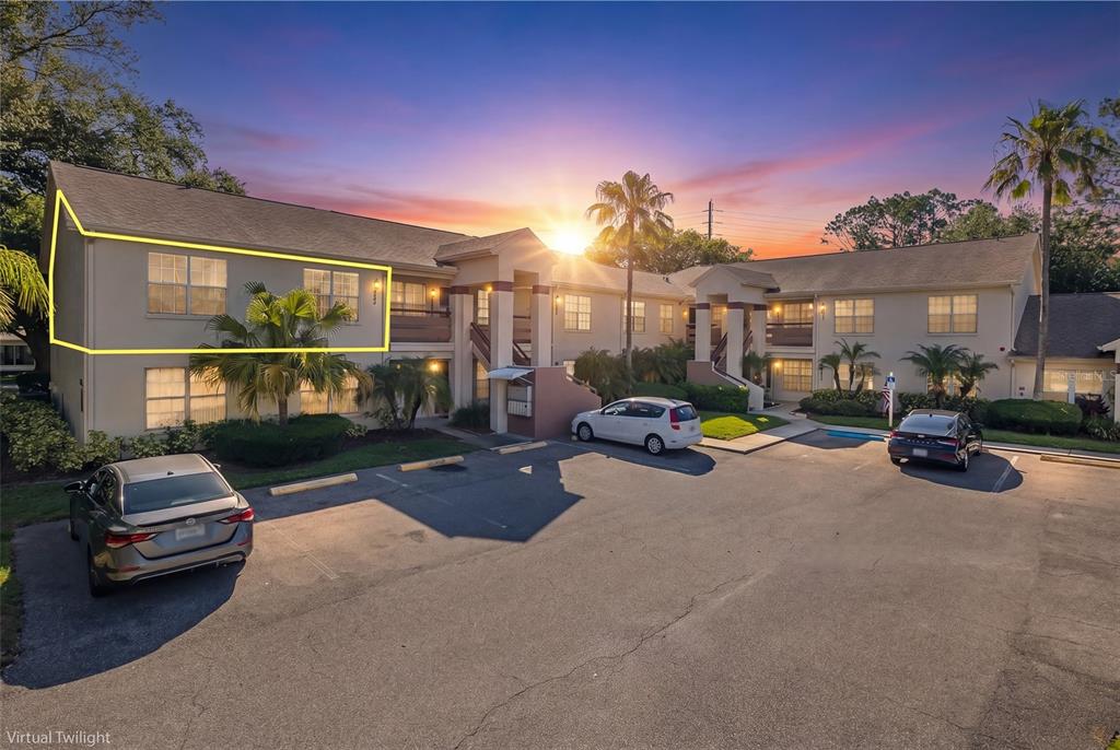7900 Hardwick Drive, Unit 827 New Port Richey, FL 34653 - Photo 1 of 27 a view of a street with cars