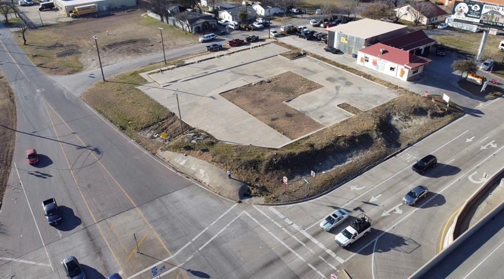 an aerial view of a house with outdoor space