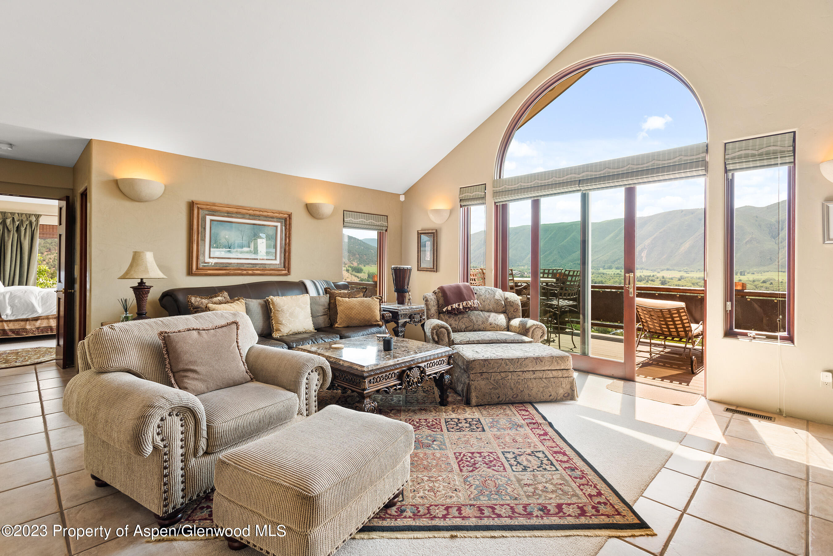 132 Ridge Road Basalt, CO 81621 - Photo 4 of 22 a living room with furniture and a large window