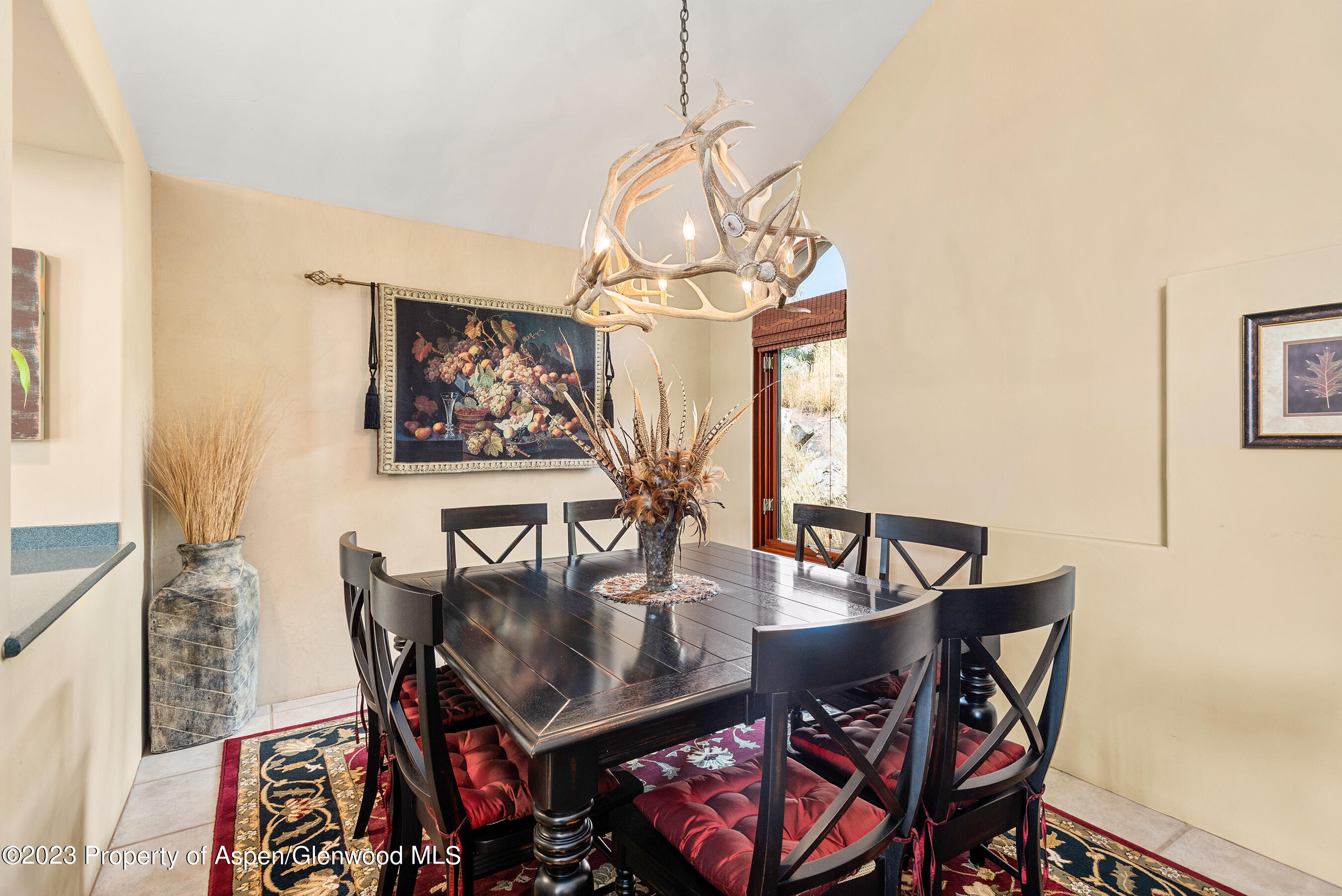 132 Ridge Road Basalt, CO 81621 - Photo 5 of 22 a view of a dining room with furniture and chandelier