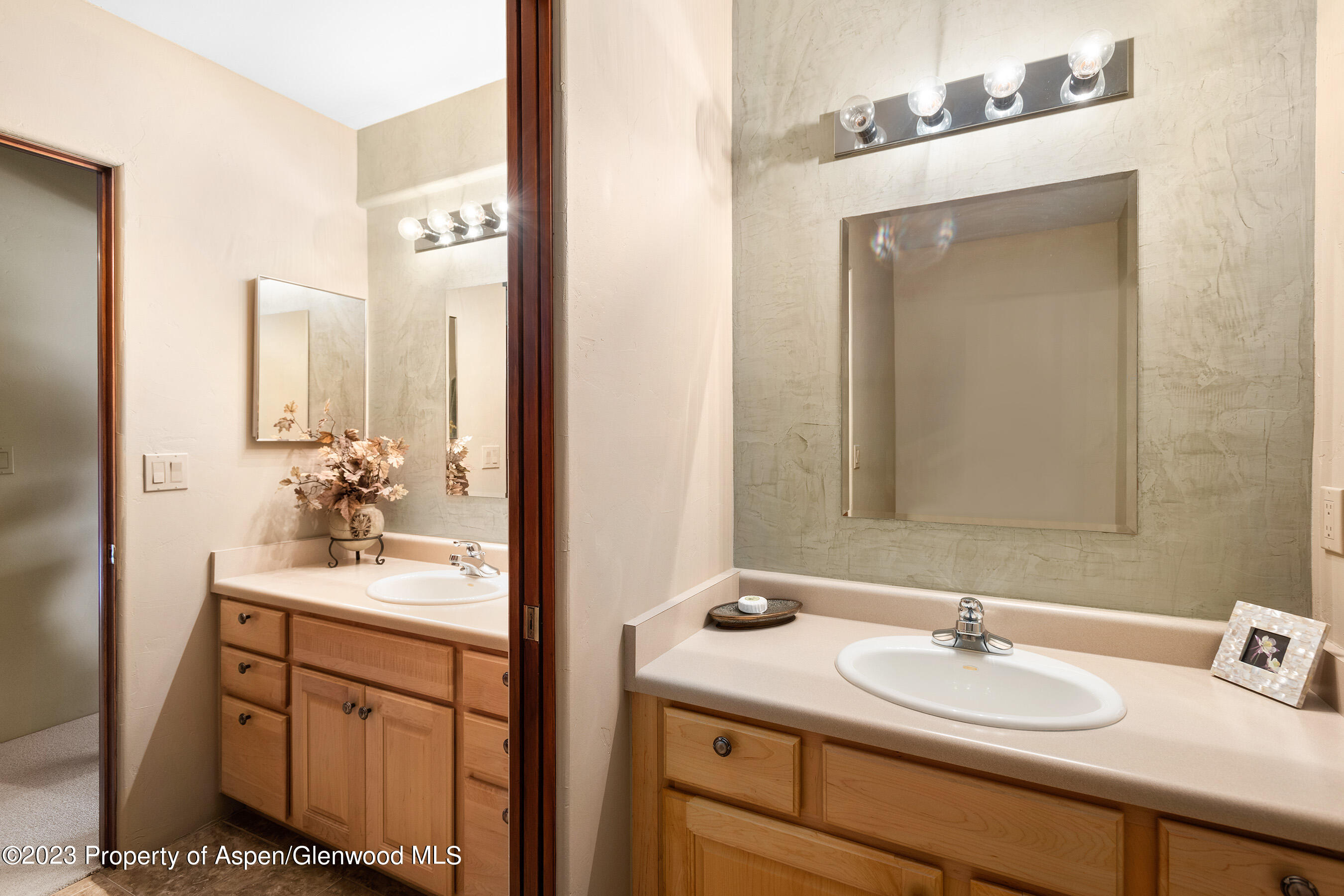 132 Ridge Road Basalt, CO 81621 - Photo 10 of 22 a bathroom with a sink vanity granite and a mirror