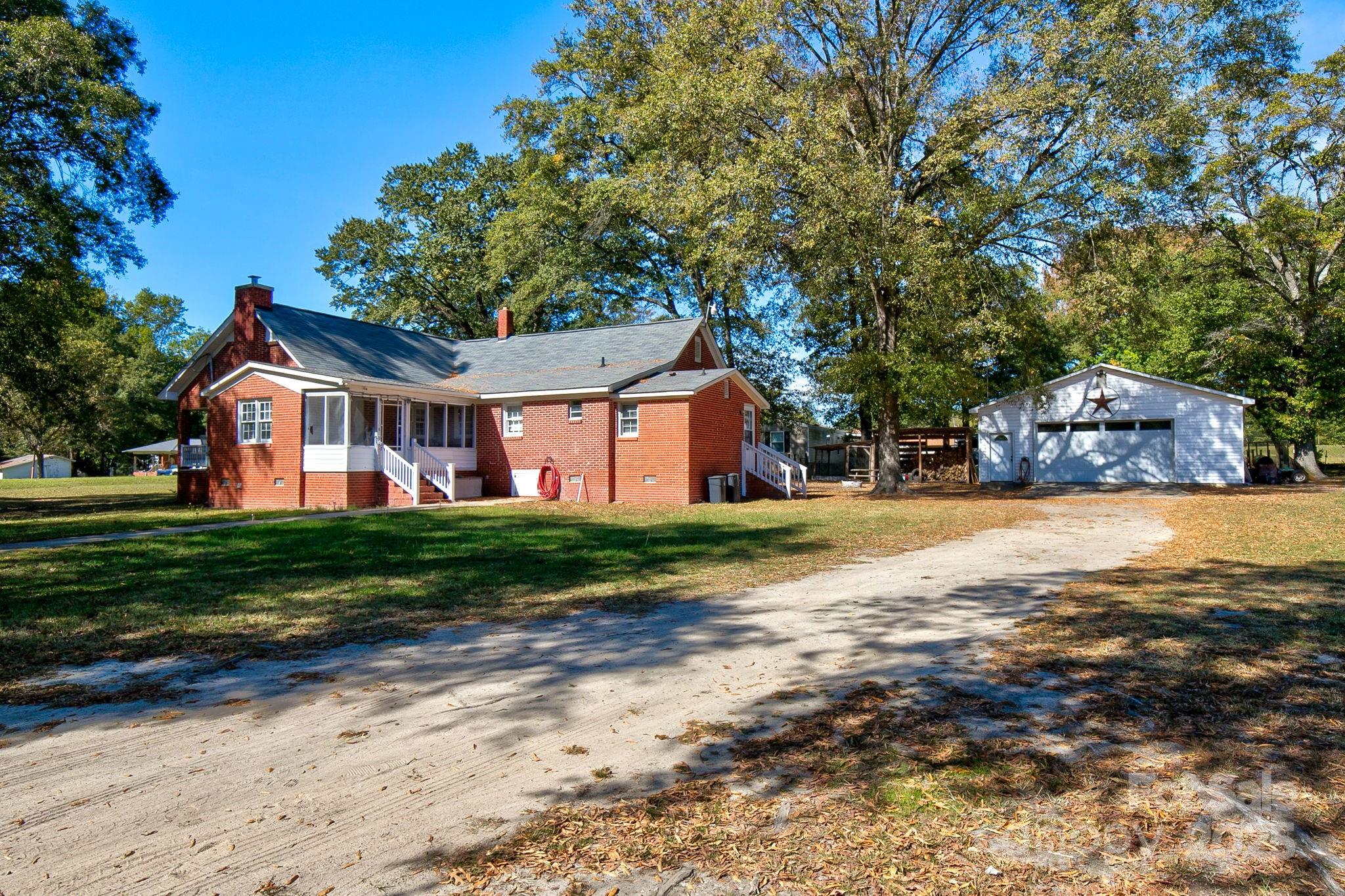 951 Evans Mill Road Pageland, SC 29728 - Photo 28 of 28 a front view of a house with a yard