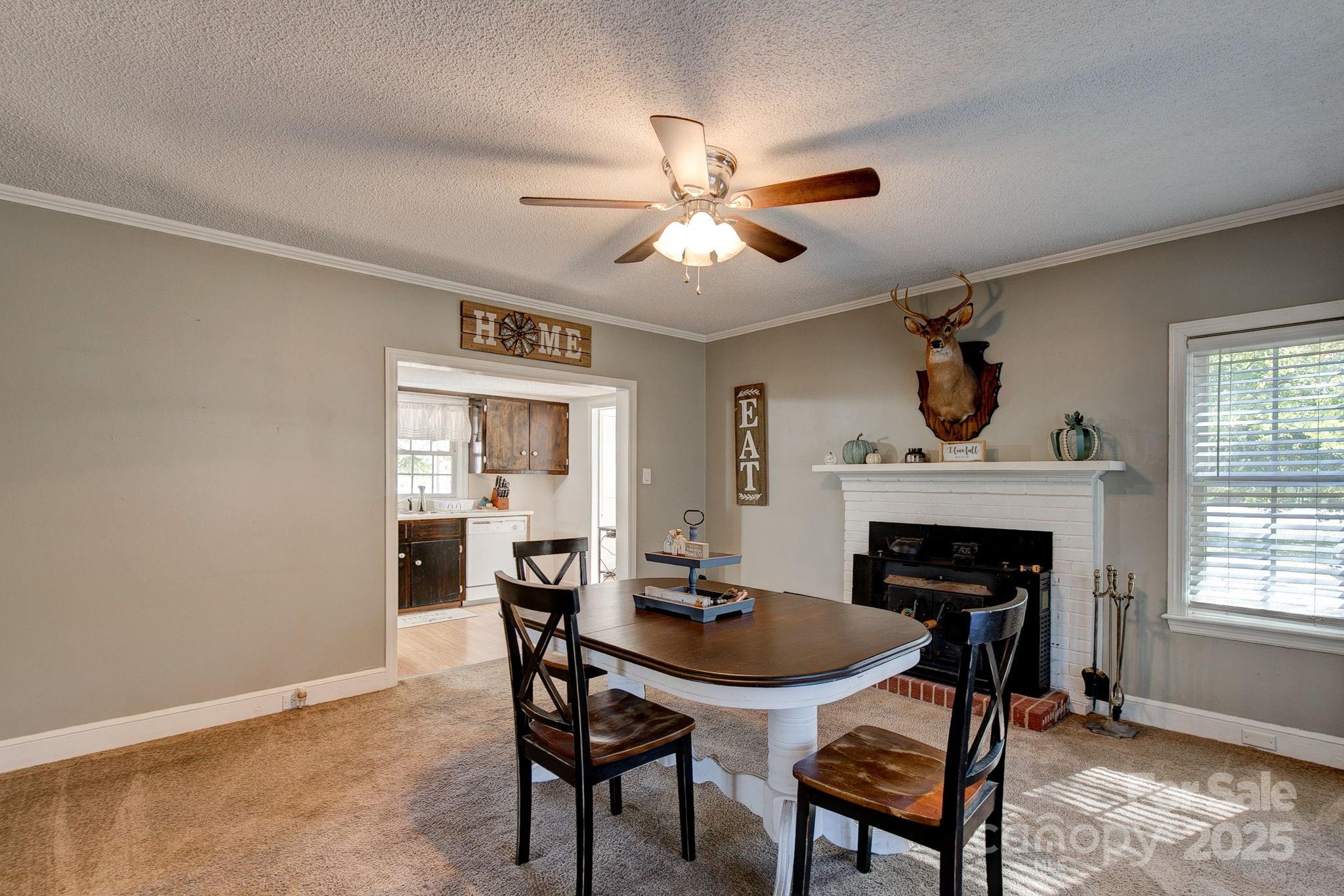 951 Evans Mill Road Pageland, SC 29728 - Photo 8 of 28 a dining room with furniture and window