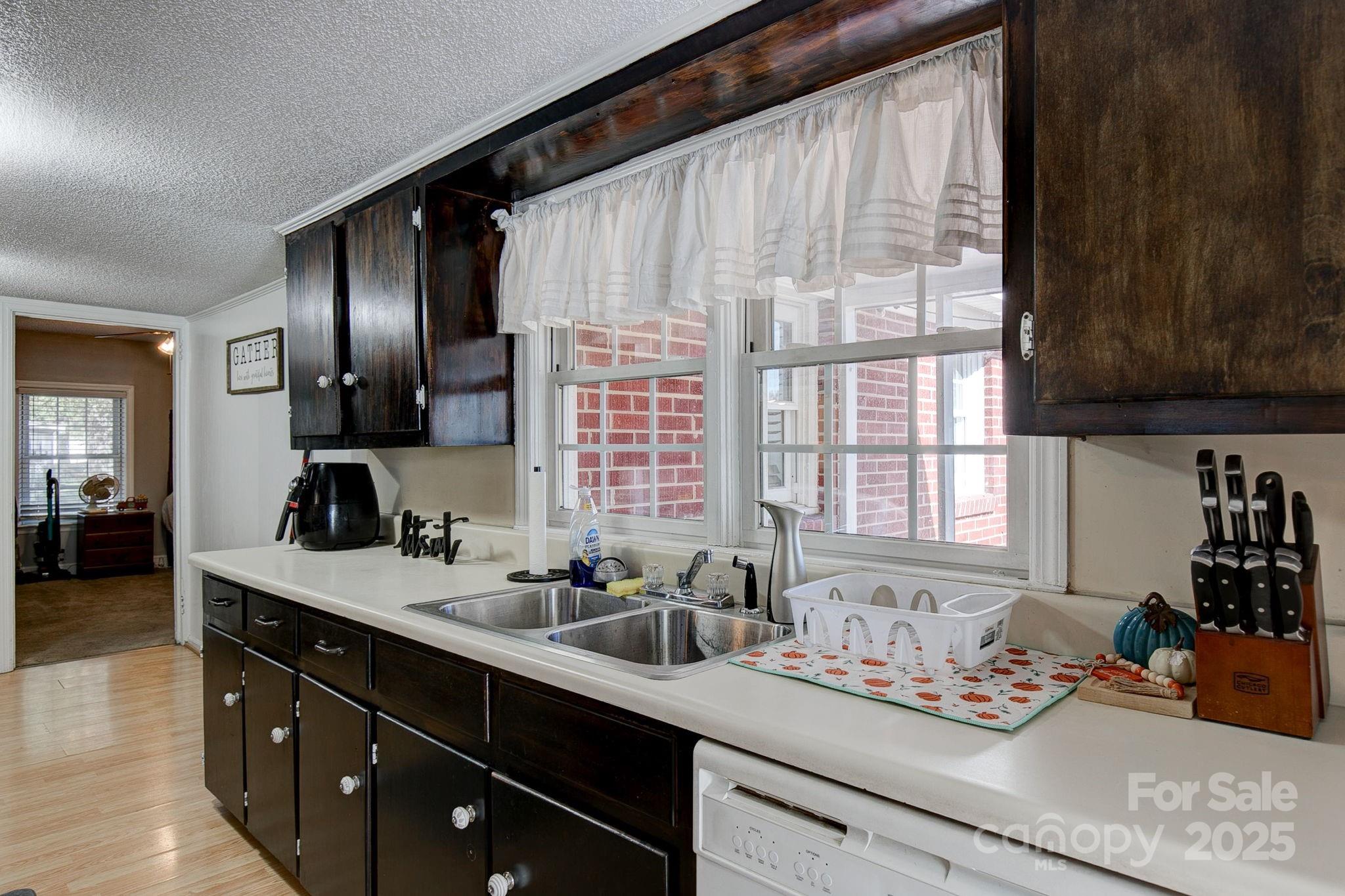 951 Evans Mill Road Pageland, SC 29728 - Photo 10 of 28 a kitchen with a sink and a window