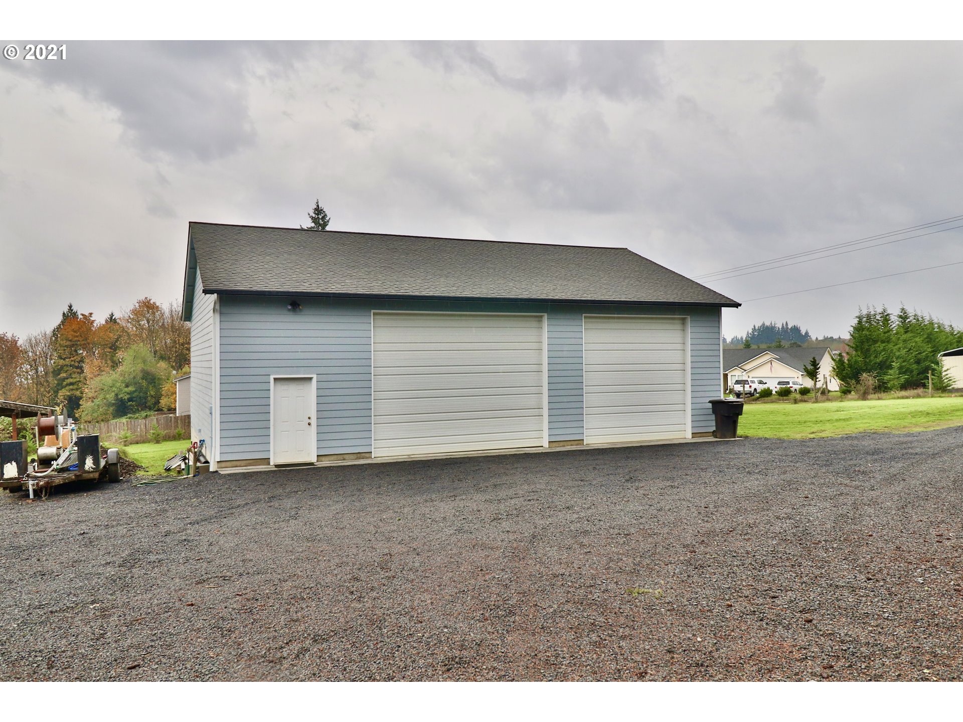 204 Wohl Road Longview, WA 98632 - Photo 28 of 31 a view of a house with a yard