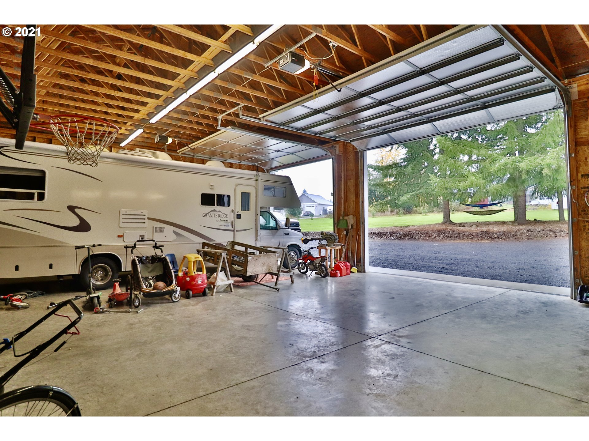 204 Wohl Road Longview, WA 98632 - Photo 31 of 31 a view of a garage with a bike