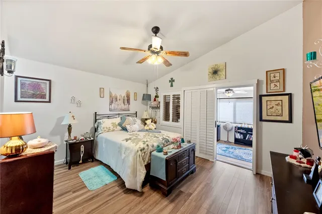 a bedroom with furniture and a window