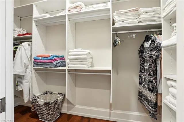 a room with a walk in closet and a window