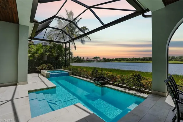 a view of swimming pool from a balcony